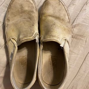 Dirty old white vans